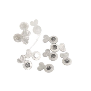 Silicone and silver heart-shaped earring backs set on a clean white background