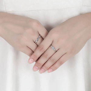 Elegant adjustable couple rings set featuring a simple male band and female diamond ring