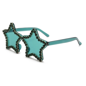 Detail of teal star-shaped sunglasses with rhinestone-encrusted edges and tinted lenses