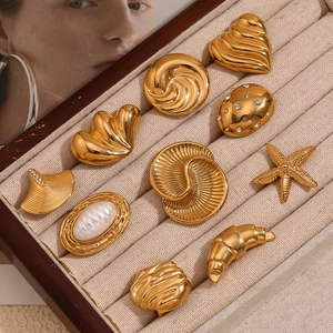 Detailed set of 10 gold-plated stainless steel brooches with pearls and rhinestones