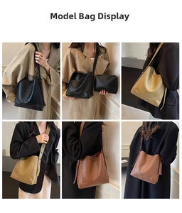 Close-up of three woven bucket bags in black, khaki, and brown on a style board