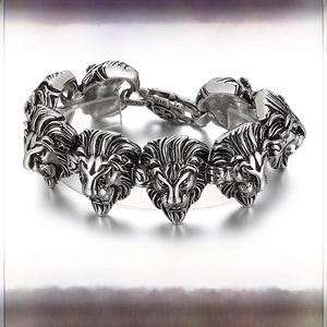 Macro shot of a heavy stainless steel lion head link bracelet showing size details