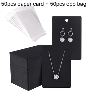 Close-up of 50pcs black jewelry display cards with matching OPP self-sealing bags