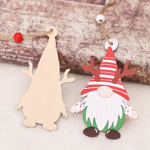 Christmas wooden faceless gnome ornament with antlers and beads on vintage background