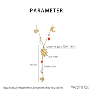 Macro view of gold celestial necklace showing heart, moon, and star charms with beads