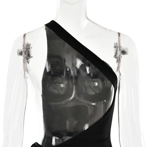 Detail of elegant black one-shoulder dress with sexy waist cutout and slim fit metal accents