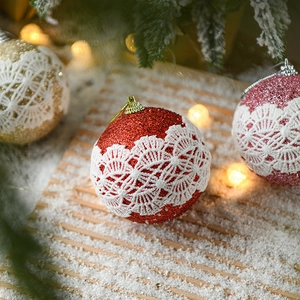 Sparkly 8cm Christmas ball ornaments with white lace trim in red, pink, and champagne gold