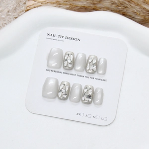 Sparkling silver cat eye press-on nails with glitter diamond accents in square-round shape