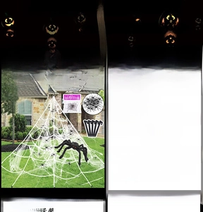 Outdoor Halloween decor kit with giant white spider web and large black spiders for parties