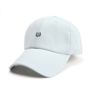 Close-up of cute black cat embroidery on a light blue cotton twill baseball cap