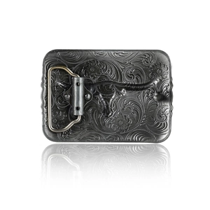 Vintage western cowboy belt buckle in antique silver metal with floral relief design