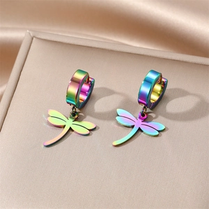 Rainbow plated stainless steel dragonfly hoop earrings on silk background