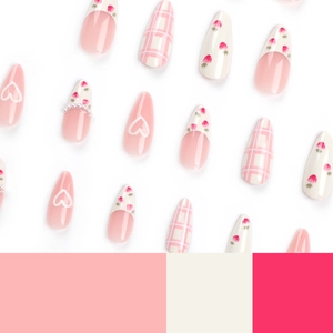 Sweet pink press-on nails with heart, strawberry patterns and plaid stiletto design