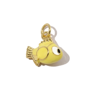 Detail of yellow enamel cartoon fish pendant with gold trim and top circular hanging ring