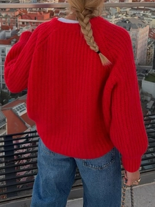 Women's casual red chunky knit sweater featuring button accents and loose raglan sleeves