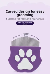 Detail showing curved metal teeth of the purple pet facial comb for sensitive areas