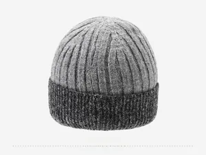 Detailed view of the gray ribbed knit texture and soft winter beanie material
