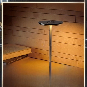 Modern rechargeable UFO led lamp showing three-color dimming and warm reading light detail