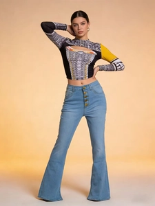 Detail view of high waist slim fit flare jeans with multi-button closure and blue denim texture