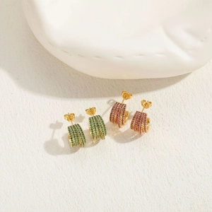 Chic gold-plated C-shaped earrings with rows of vibrant green and pink zircon stones