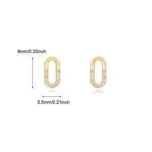 Detail showing 9mm gold oval stud earrings with inset cubic zirconia stones