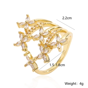 Detailed view of irregular gold floral ring with marquise-cut cubic zirconia crystals
