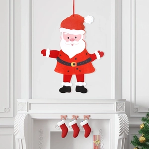 Large felt Santa Claus ornament with movable joints displayed on a festive white fireplace