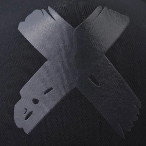 Premium black trucker mesh cap featuring a stylish 3D brushstroke X logo print on the front