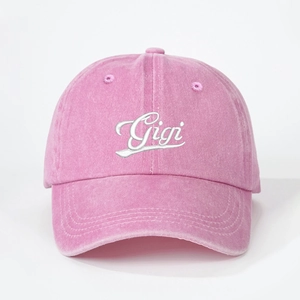 Vintage pink washed cotton baseball cap with white Gigi letter embroidery and curved brim