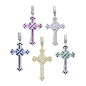 Macro shot of cross pendants with colorful zircon inlay in various plating finishes