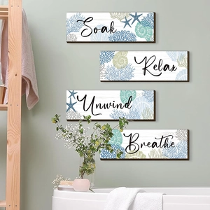 Set of four coastal wooden wall plaques with Relax, Soak, Unwind, and Breathe text