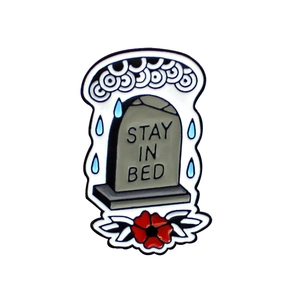 Stay In Bed tombstone enamel brooch with red flowers in vintage tattoo style