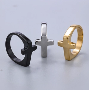Three-piece stainless steel cross rings in black, silver and gold with polished finish