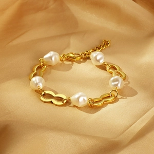 Bracelet en titane plaqué or 18 carats avec maillons en huit et perles en résine