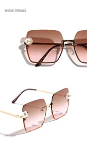 Detail of square oversized gradient sunglasses with pearl accents and gold metal temples