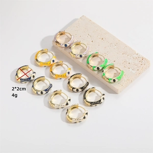 Minimalist evil eye enamel hoop earrings in six vibrant colors for a bohemian style look