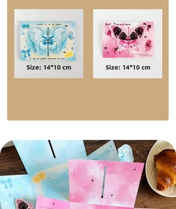 Detail view of 3D pop-up butterfly greeting cards with pink and blue floral designs