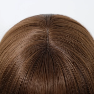 Close-up of realistic scalp parting and brown hair texture for long wavy wig