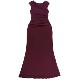 Detail of elegant wine red sleeveless gown featuring sophisticated waist pleats and drapes