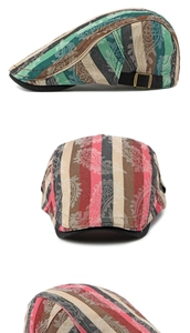 Detail of striped cotton beret cap featuring adjustable metal buckles and paisley texture