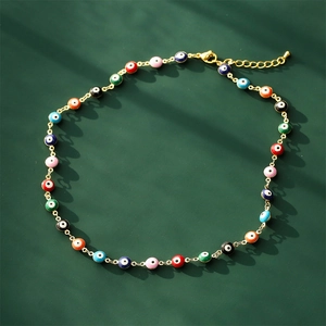 Gold-plated chain necklace with colorful enamel Evil Eye charms and lobster clasp closure