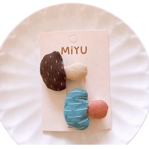 Cute mushroom-shaped fabric hair clips in brown and blue for girls hair styling