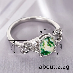 Elegant silver ring with oval moss agate and zircon stones featuring 8x6mm dimensions