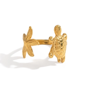 Détails de breloques étoile de mer et tortue sur bague ajustable dorée océan