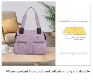 Detail view of water-resistant light purple tote bag with multi-pocket functional design
