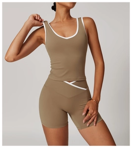 Detail of high-stretch yoga set with cross V-waist shorts and contrast binding design