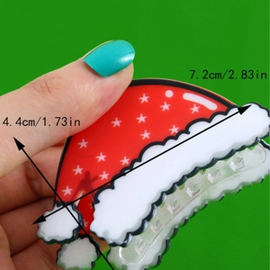 Christmas Santa hat hair claw clip in red and white with stars, 7.2cm length size
