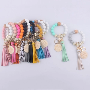 Silicone bead tassel wristlet keychain with wooden MAMA charm in various colors