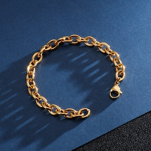 Detailed close-up of a chunky golden link chain bracelet in durable stainless steel