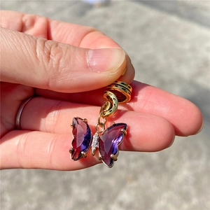 Golden hip hop hair ring with purple crystal butterfly charm and sparkling diamonds